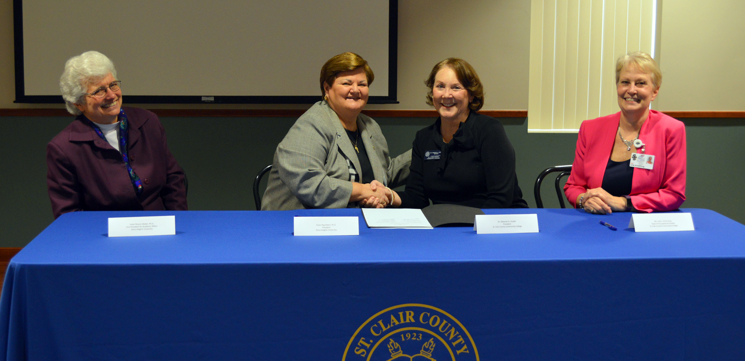 Siena Heights articulation agreement signing