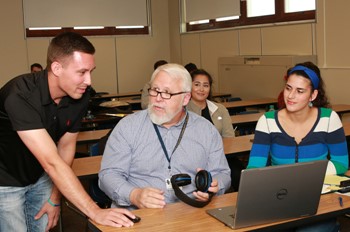 Professor with students in class.