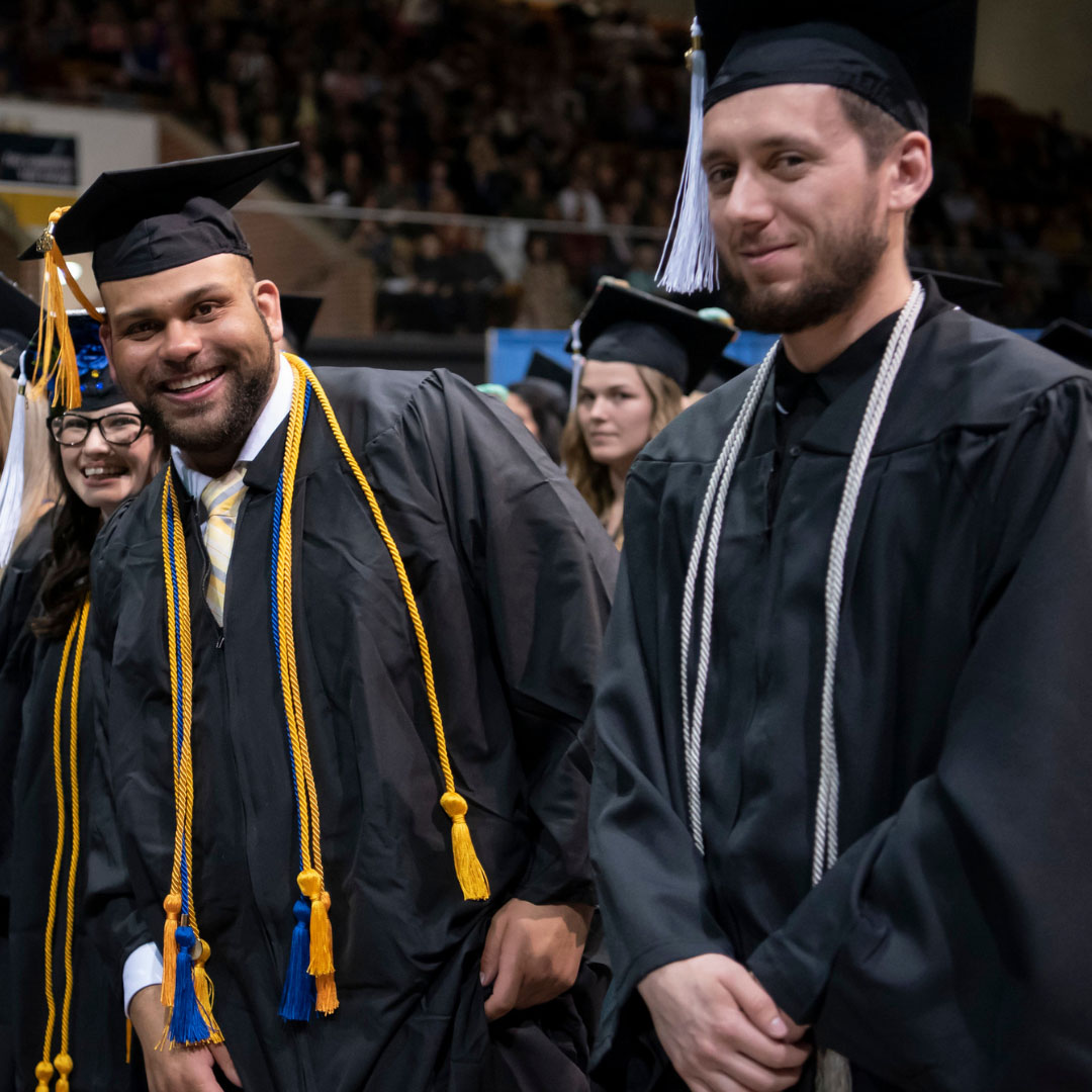 Grads smiling