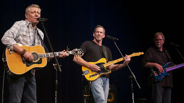 Band playing guitars