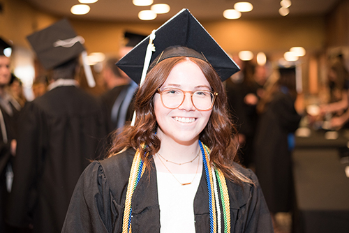 Grad smiles