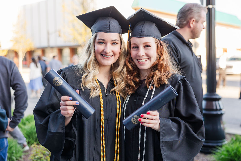 students with their diploma