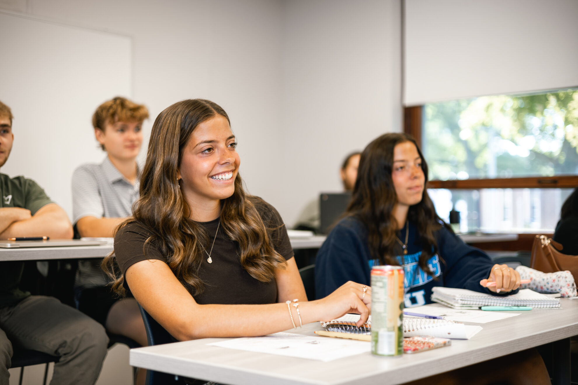 Student sitting in business class
