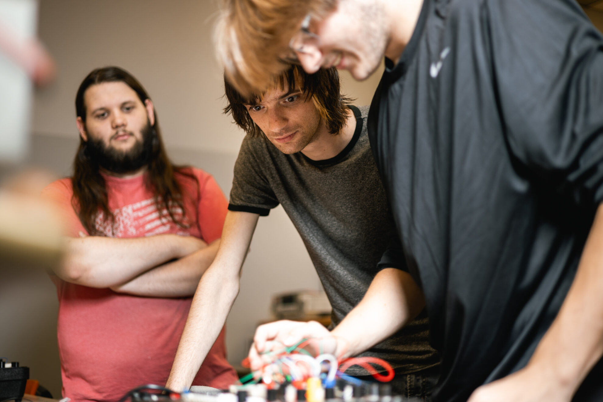 student working on electronics