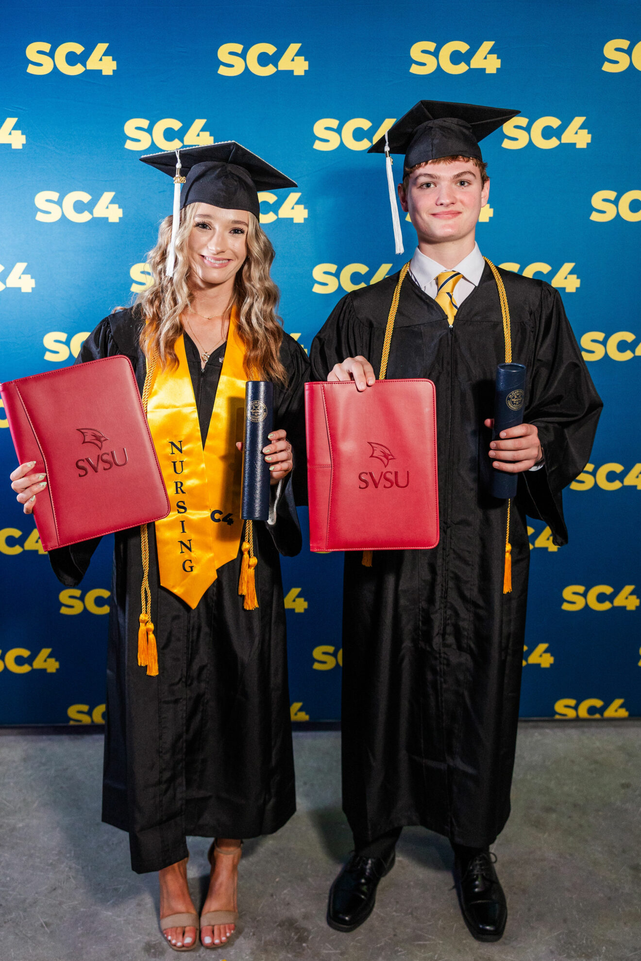 2 graduating students